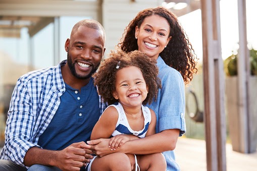 Dental Services - Dentistry on Tower - Family Smiling